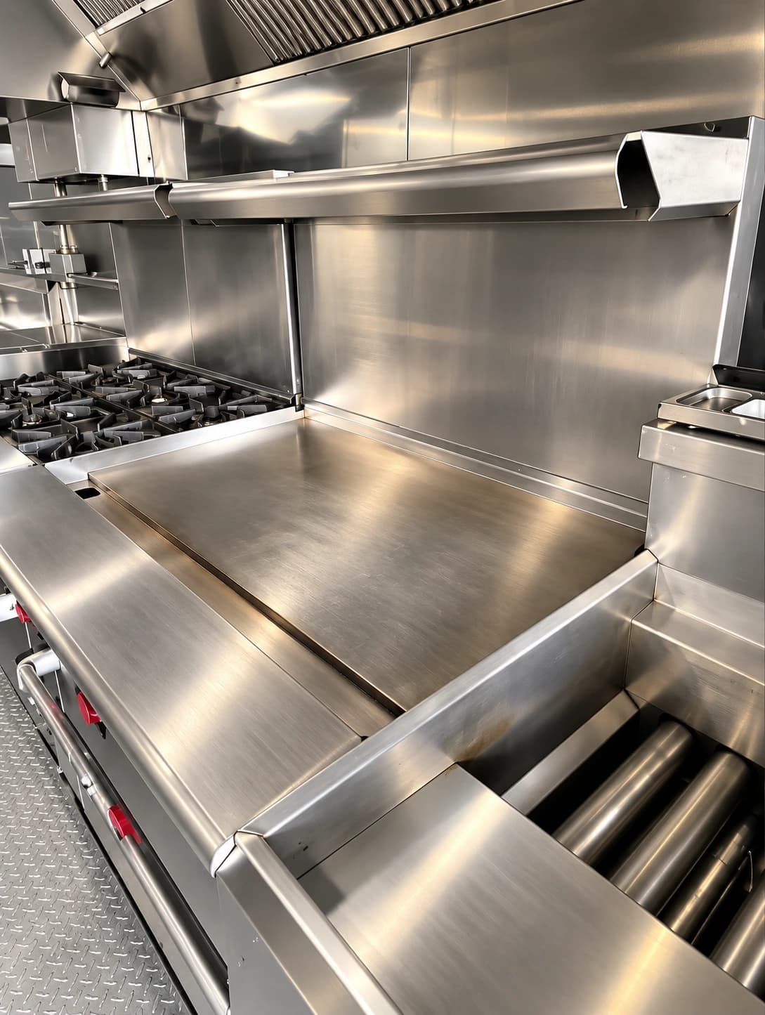 Commercial kitchen trailer flat top griddle range.