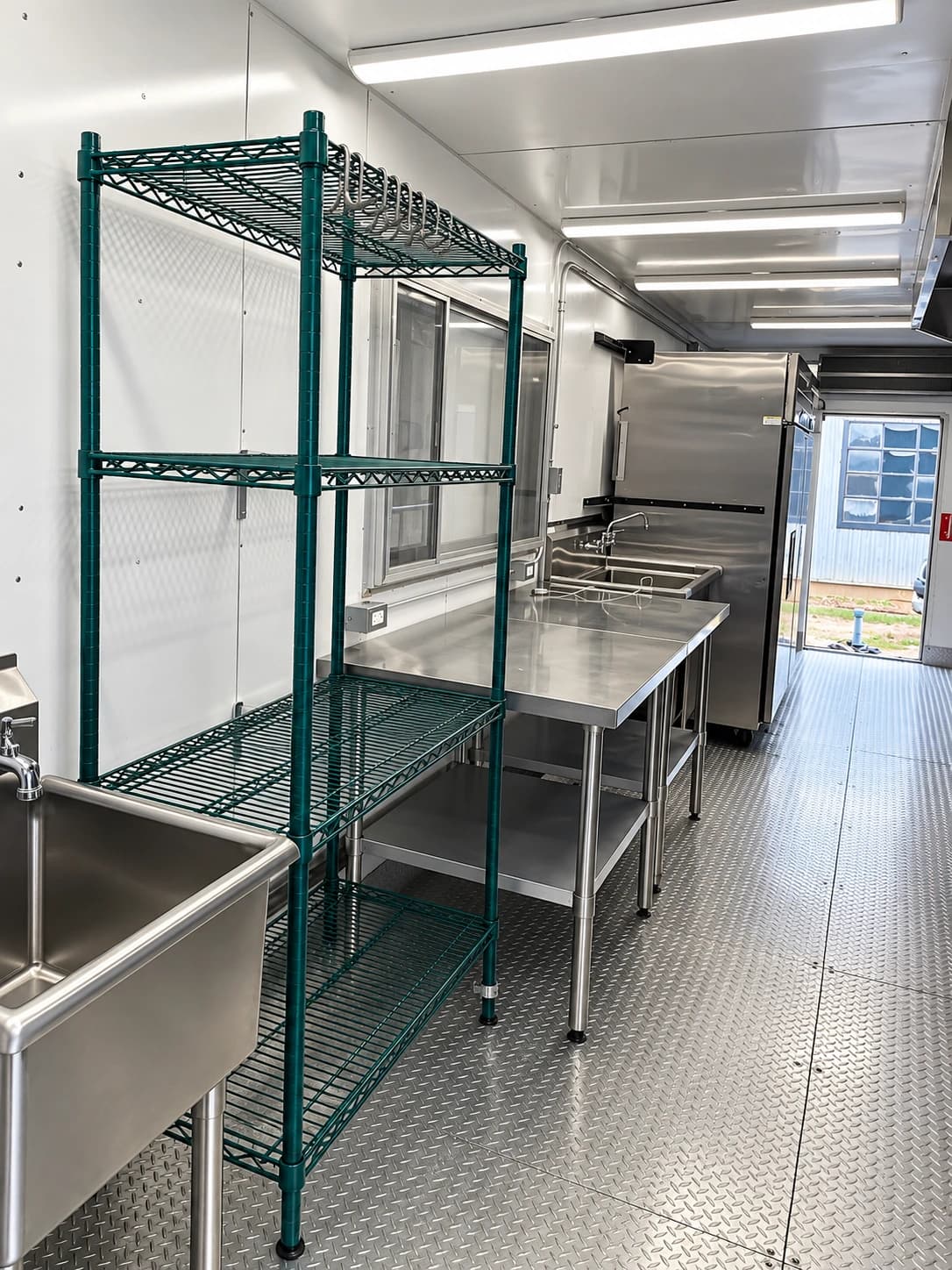 Temporary kitchen trailer prep and wash area.